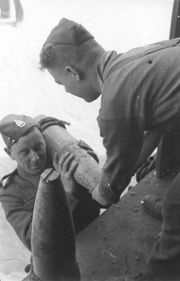 Soldiers of the Royal Army Ordnance Corps preparing ammunition for transportation during the Second World War